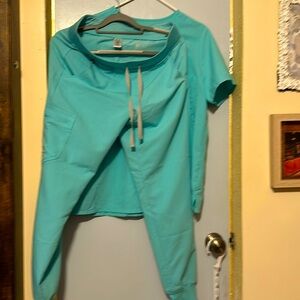 Figs scrubs, top size large and pants size medium
